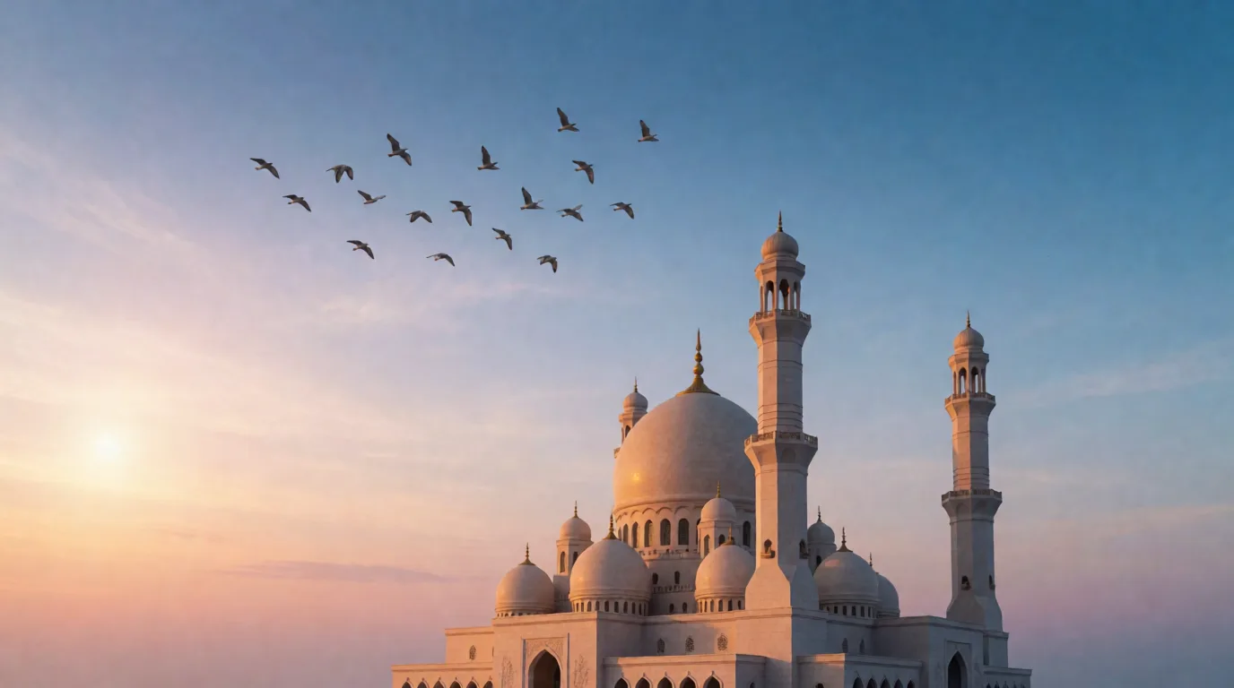 Gün doğumu ışığında kubbeli bir cami ve minareler, üstte uçan kuşlar